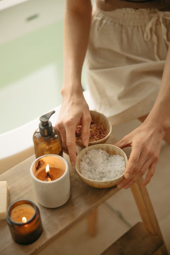 Create a calming home spa experience with natural salts and soothing candlelight.